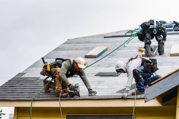 Professional Roofing technician working in Weehawken, NJ
